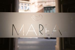 Marea Boutique Hotels في سليمة: علامة تقول narma على الباب