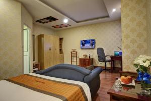TV a/nebo společenská místnost v ubytování Vong Xua Boutique Hotel