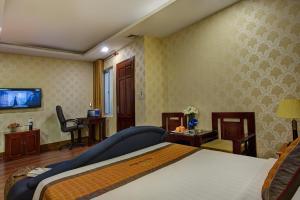 TV a/nebo společenská místnost v ubytování Vong Xua Boutique Hotel