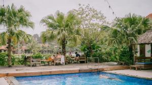The swimming pool at or close to The Banana Tree Hostel
