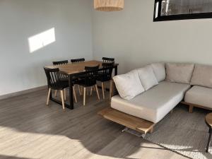 Posezení v ubytování ALMA Lodge