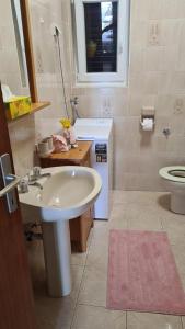 Kúpeľňa v ubytovaní Apartment Biondić
