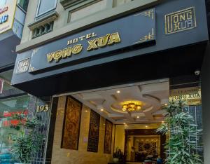 a building with a sign for a yongko kushka at Vong Xua Boutique Hotel in Hanoi