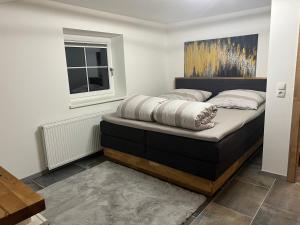 Łóżko lub łóżka w pokoju w obiekcie Ferienwohnung Krallinger