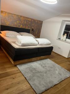Łóżko lub łóżka w pokoju w obiekcie Ferienwohnung Krallinger