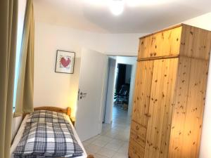 Postel nebo postele na pokoji v ubytování Jordsand