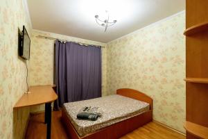 Postel nebo postele na pokoji v ubytování Kvartirkoff na Levka Lukyanenko 3v