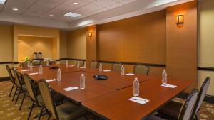 a conference room with a long table and chairs at Sonesta Select Austin North Central in Austin +16 photos