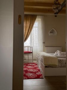 Postel nebo postele na pokoji v ubytování ROSETO HOLIDAYS AZZURRO
