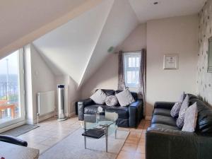 Гостиная зона в The Beach House, Luxury Apartments