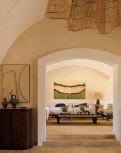 a living room with a couch and a table at Tenuta Negroamaro in Gallipoli