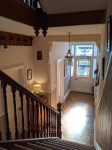 a staircase in a house with a stair case at Clarence House in Keswick