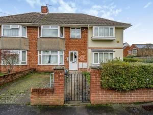 a red brick house with a black gate at Pass the Keys Stylish 2BR Apartment Parking x 2 Oxford in Oxford