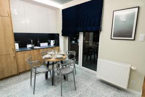 Kuchyňa alebo kuchynka v ubytovaní D Apartments Centrum Woda