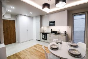 Kuchyňa alebo kuchynka v ubytovaní D Apartments Centrum Powietrze