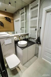 Kúpeľňa v ubytovaní D Apartments Centrum Powietrze