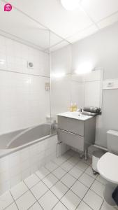 Kúpeľňa v ubytovaní Le Beausoleil par iZiLi - Calme et confort - Futuroscope