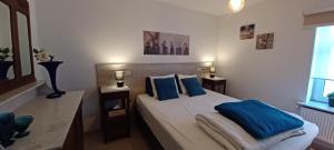 Postel nebo postele na pokoji v ubytování Charta Appartement