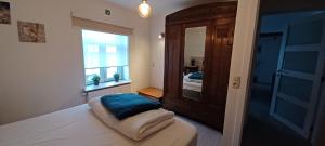 Postel nebo postele na pokoji v ubytování Charta Appartement