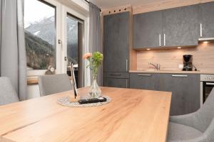 Kuchyňa alebo kuchynka v ubytovaní Bergnest Oetztal - Appartements