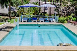 Bazén v ubytování Papillon Garden Bar Villas nebo v jeho okolí