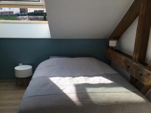 Łóżko lub łóżka w pokoju w obiekcie Centre superbe appt 6 personnes avec terrasse classé 3 étoiles