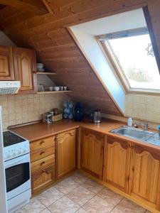 A kitchen or kitchenette at Vidiecky dom AlexSandra - ubytovanie v súkromí