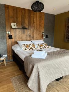 Postel nebo postele na pokoji v ubytování Bed and Breakfast Geliefd