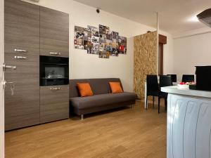 A television and/or entertainment centre at Eclectic Space Padova two apartments