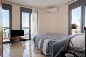 Posteľ alebo postele v izbe v ubytovaní Georgia seaview apartments Α2