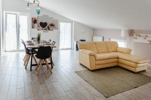 Χώρος καθιστικού στο Minerva Holiday Home