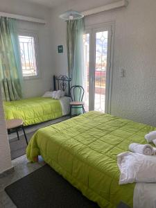 Postel nebo postele na pokoji v ubytování VALIA ROOMS