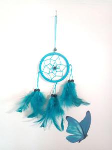 a blue dream catcher with a butterfly on it at in lak'ech - rooms in Chironico