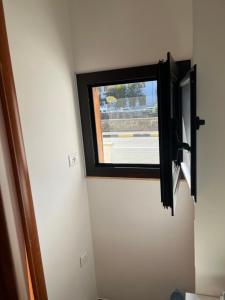TV a/nebo společenská místnost v ubytování Appartamento Madame