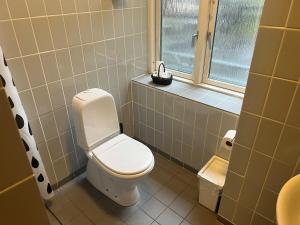 Koupelna v ubytování Hotel 9 små hjem