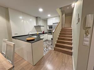 Una cocina o zona de cocina en Apartamentos Valle de Inclés Deluxe MIKKA 3000