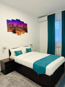 Postel nebo postele na pokoji v ubytování Apec Hotel