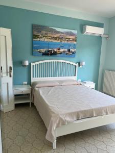Postel nebo postele na pokoji v ubytování Casa Tacconi