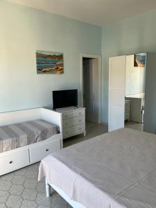 Postel nebo postele na pokoji v ubytování Casa Tacconi