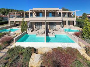 The swimming pool at or close to Cavo Delea Villas & Suites