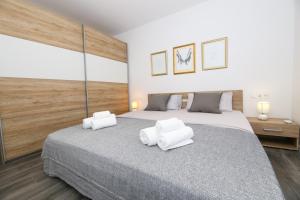 Postel nebo postele na pokoji v ubytování Holiday home Ambi for 6 near Trogir + 34 fotografií