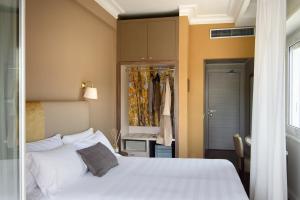 Postel nebo postele na pokoji v ubytování Silva Hotel Splendid