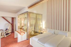 Postel nebo postele na pokoji v ubytování Hotel Kiwano Graz