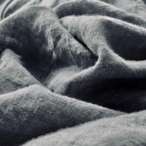 a close up of a gray blanket with at Economy Autto in Levi