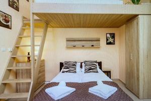 Ένα ή περισσότερα κρεβάτια σε δωμάτιο στο Apartament 7 minut od Krupówek na nogach!