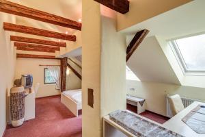 Postel nebo postele na pokoji v ubytování Hotel Kiwano Graz