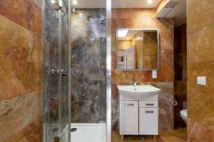 Ένα μπάνιο στο Apartamenty SZUMiWODA