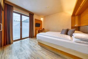 Postel nebo postele na pokoji v ubytování MOTA hotel