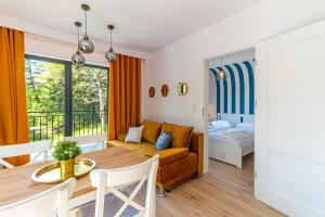 Postel nebo postele na pokoji v ubytování Apartamenty Sailor