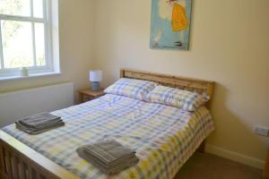 Sleeps 8 Matlock/ Matlock Bath Pet Friendly客房内的一张或多张床位